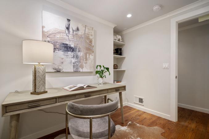 Property Thumbnail: Office with light grey walls and crown moulding 