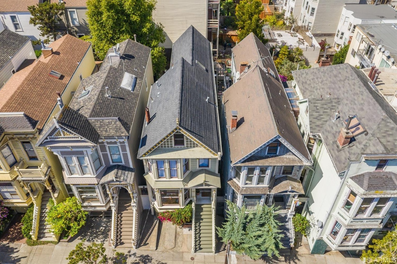 Property Photo: Aerial view of 277 Central Ave, showing neighboring Victorian homes