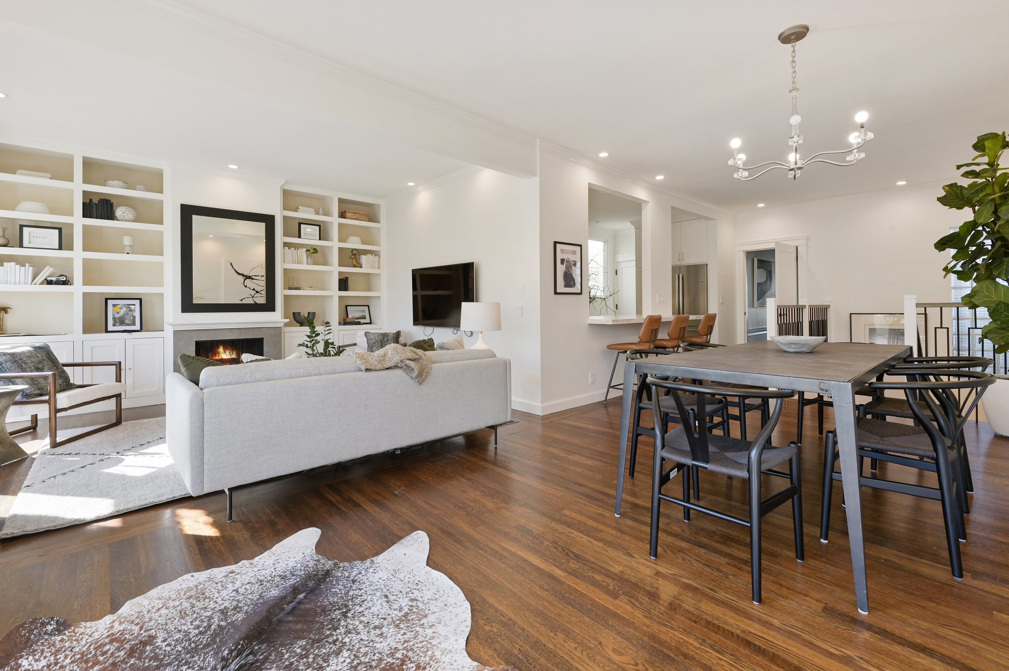Property Photo: Open floor plan view of the living room and dining are