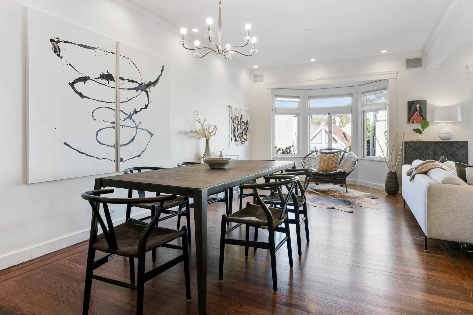 Property Photo: View of the dining area with a seating area by the bay window