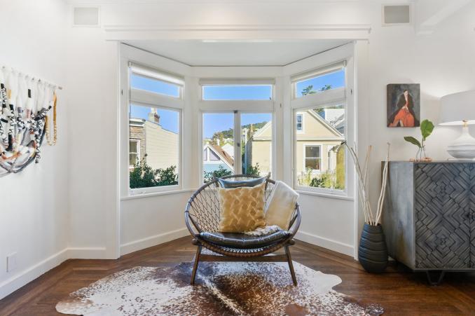 Property Thumbnail: Close-up view of a sitting area near a bay window