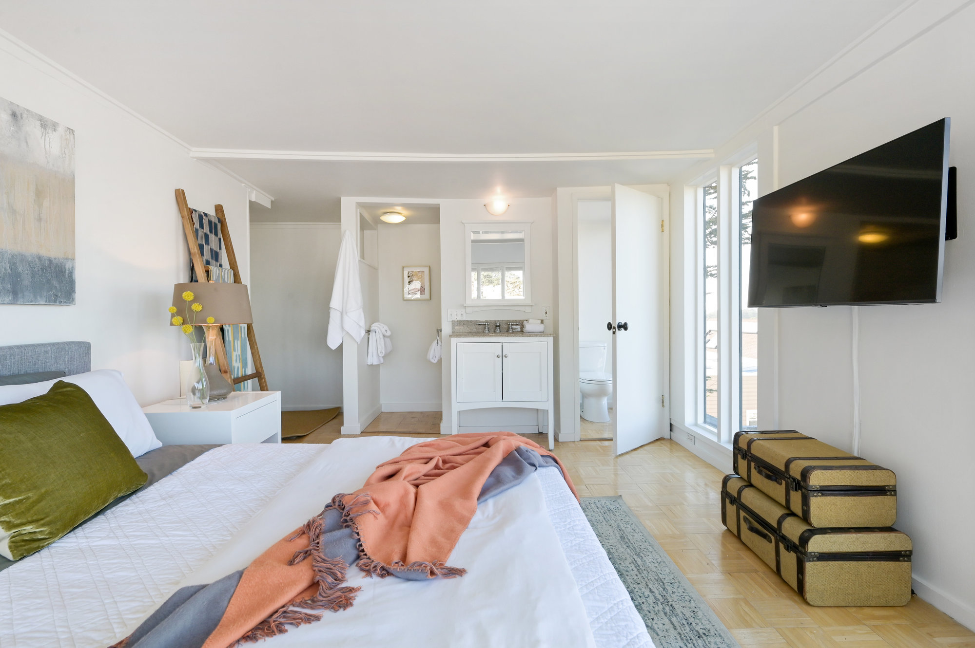 Property Photo: Bedroom with a view of the closet space and bathroom