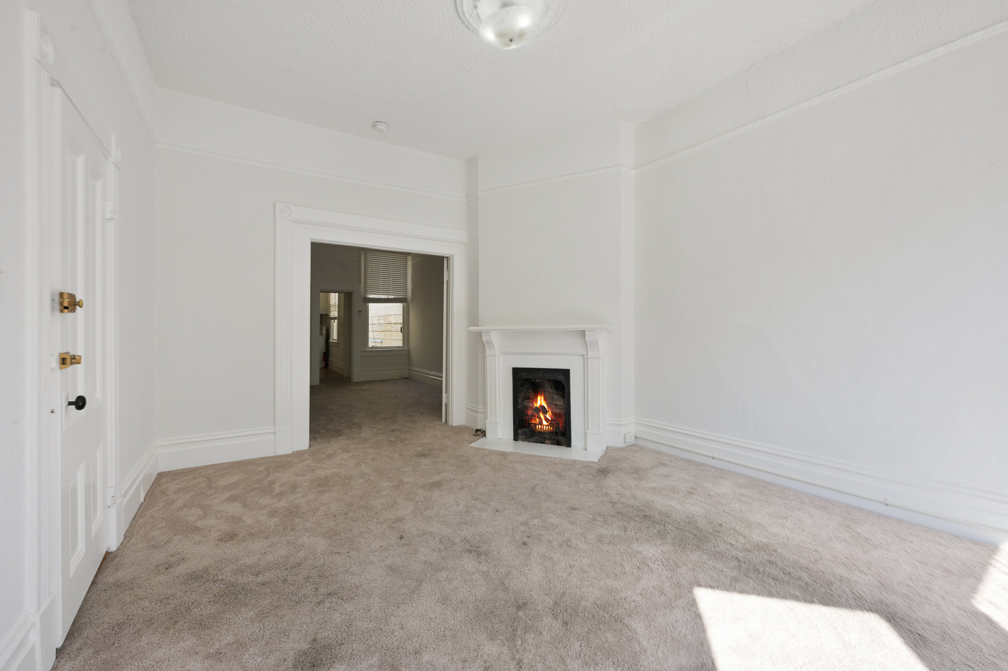 Property Photo: Room with a fireplace