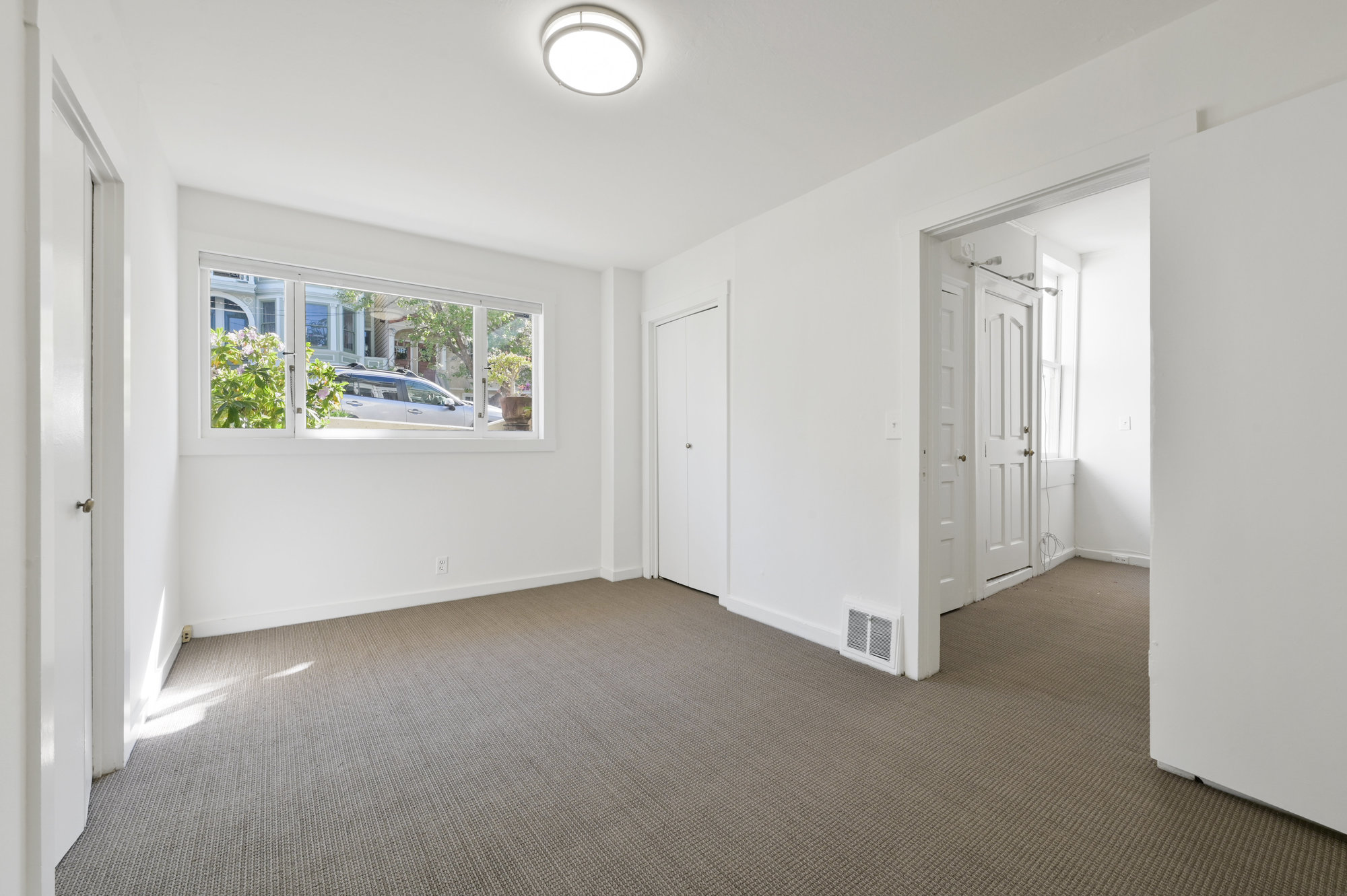 Property Photo: View of a bedroom with long window