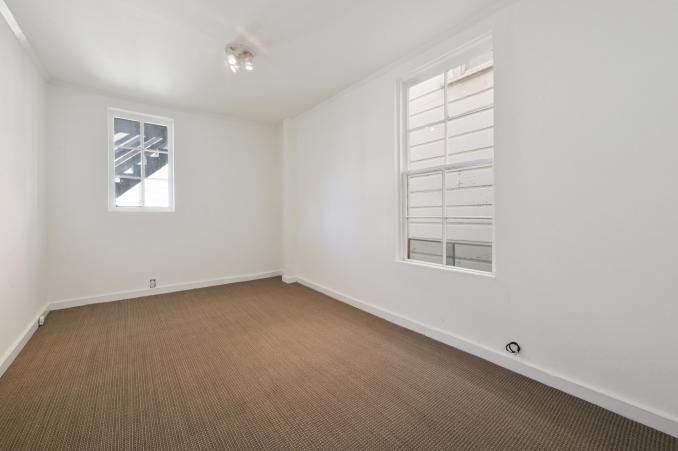 Property Thumbnail: View of a long room with carpeting and two large windows