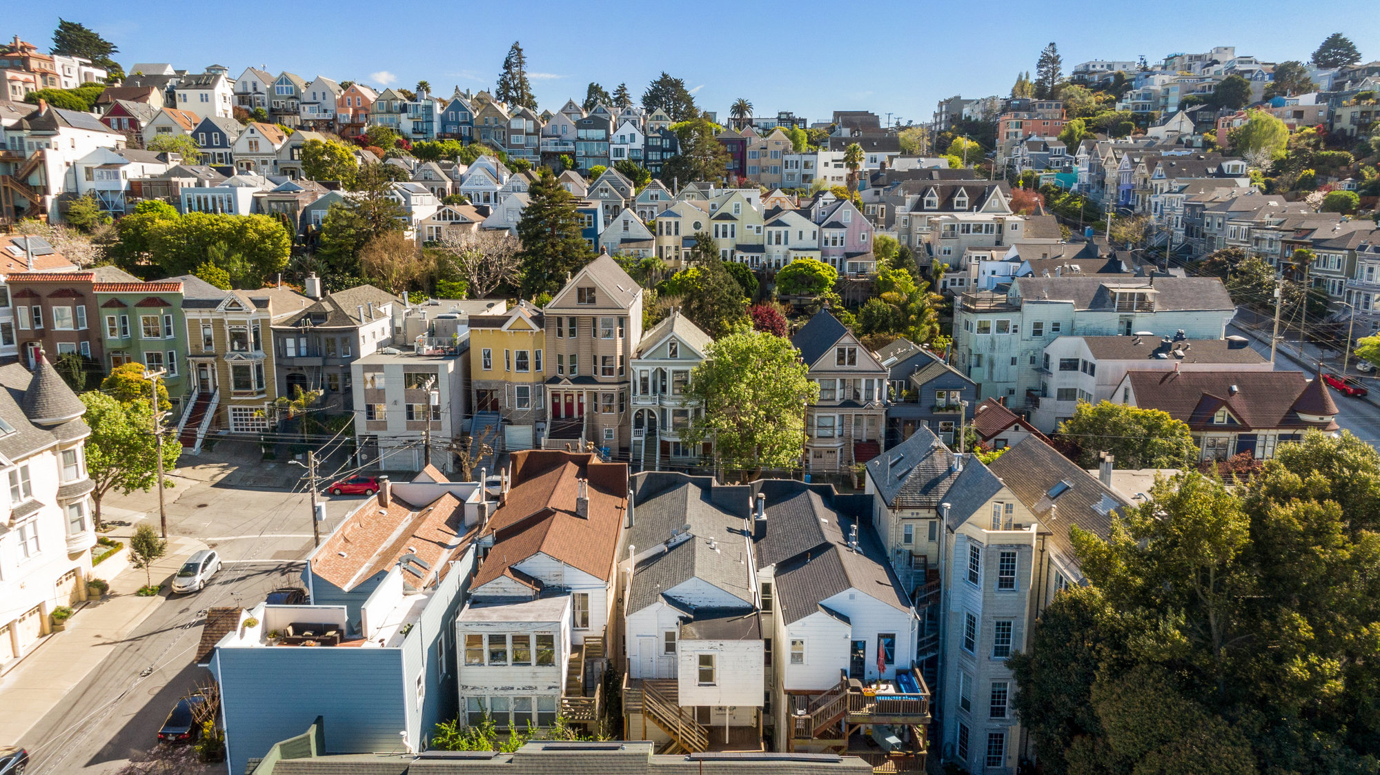 Property Photo: View of 20th street from above 4160-4162 20th Street, showing a row of prettily painted homes