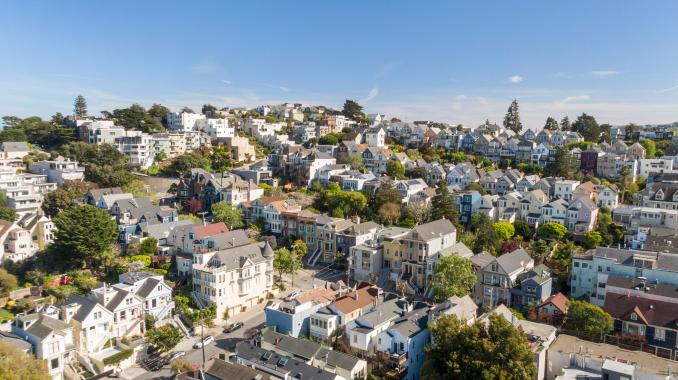 Property Thumbnail: Wide-shot aerial view of 4160-4162 20th Street, showing the rear of the home and the city beyond