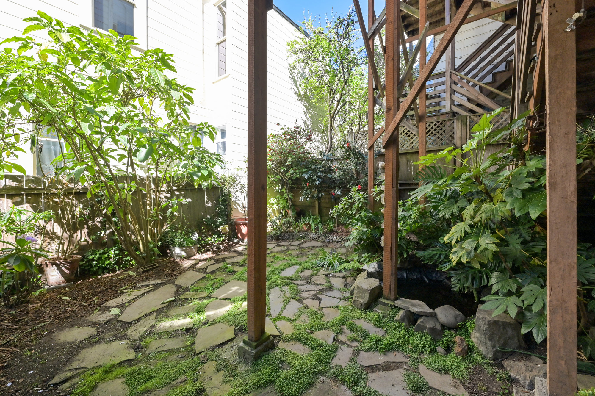 Property Photo: View of the lower stone patio area