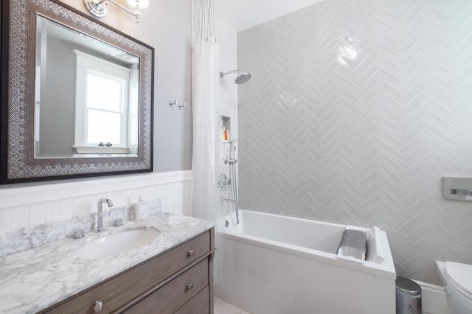 Property Thumbnail: Bathroom with large soaking tub and lux wall tiling 