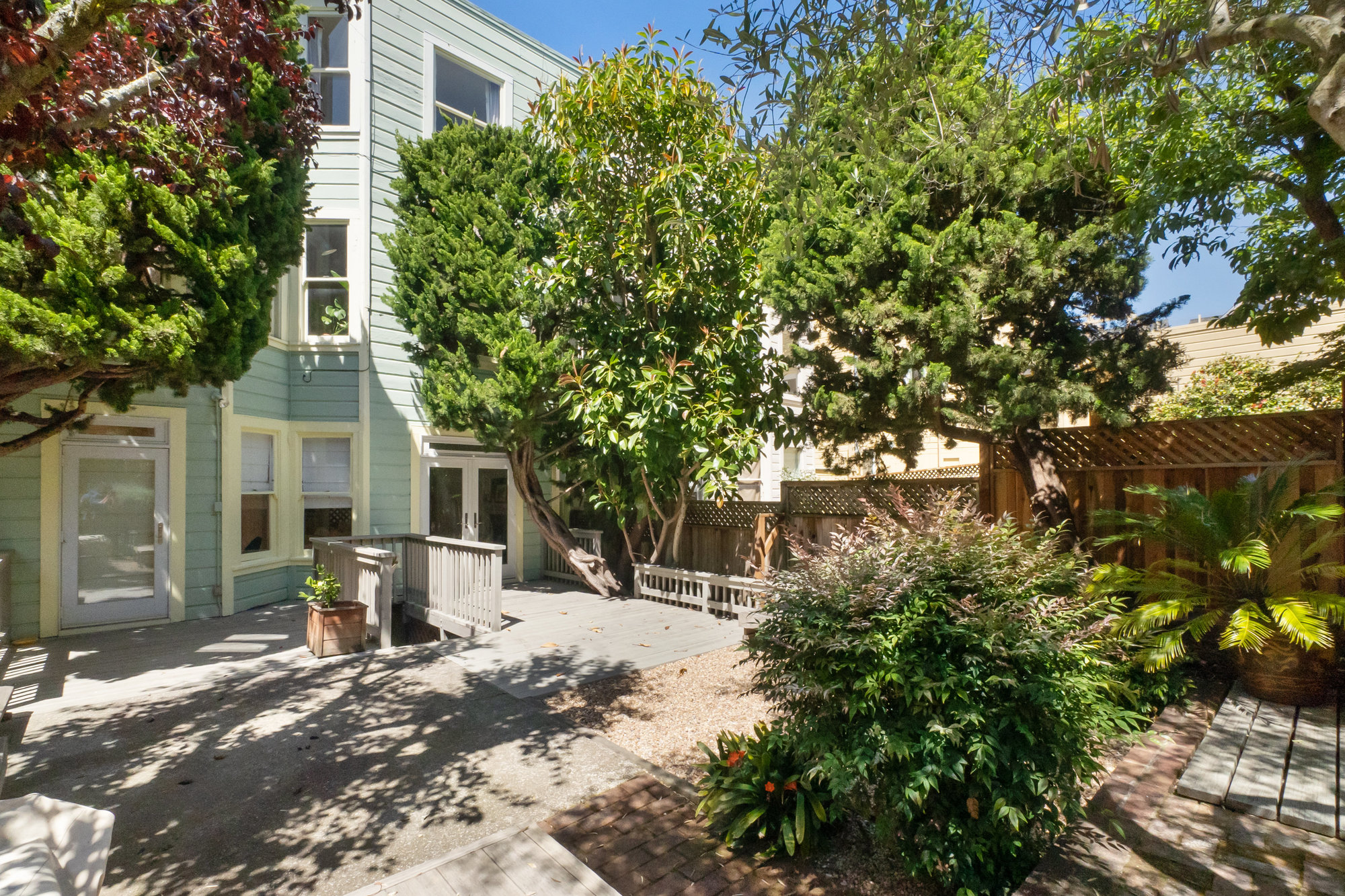 Property Photo: Rear view of 1473 Waller Street, as seen from the yard