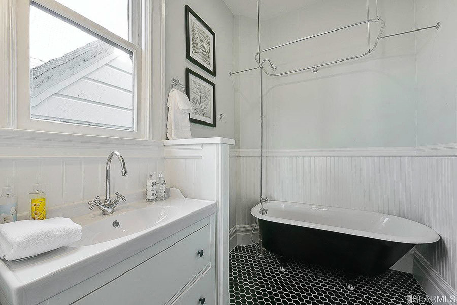 Property Photo: View of a bathroom with free-standing bathtub 