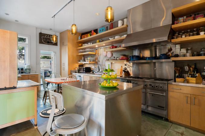 Property Thumbnail: View of the large chefs kitchen featuring tile floors