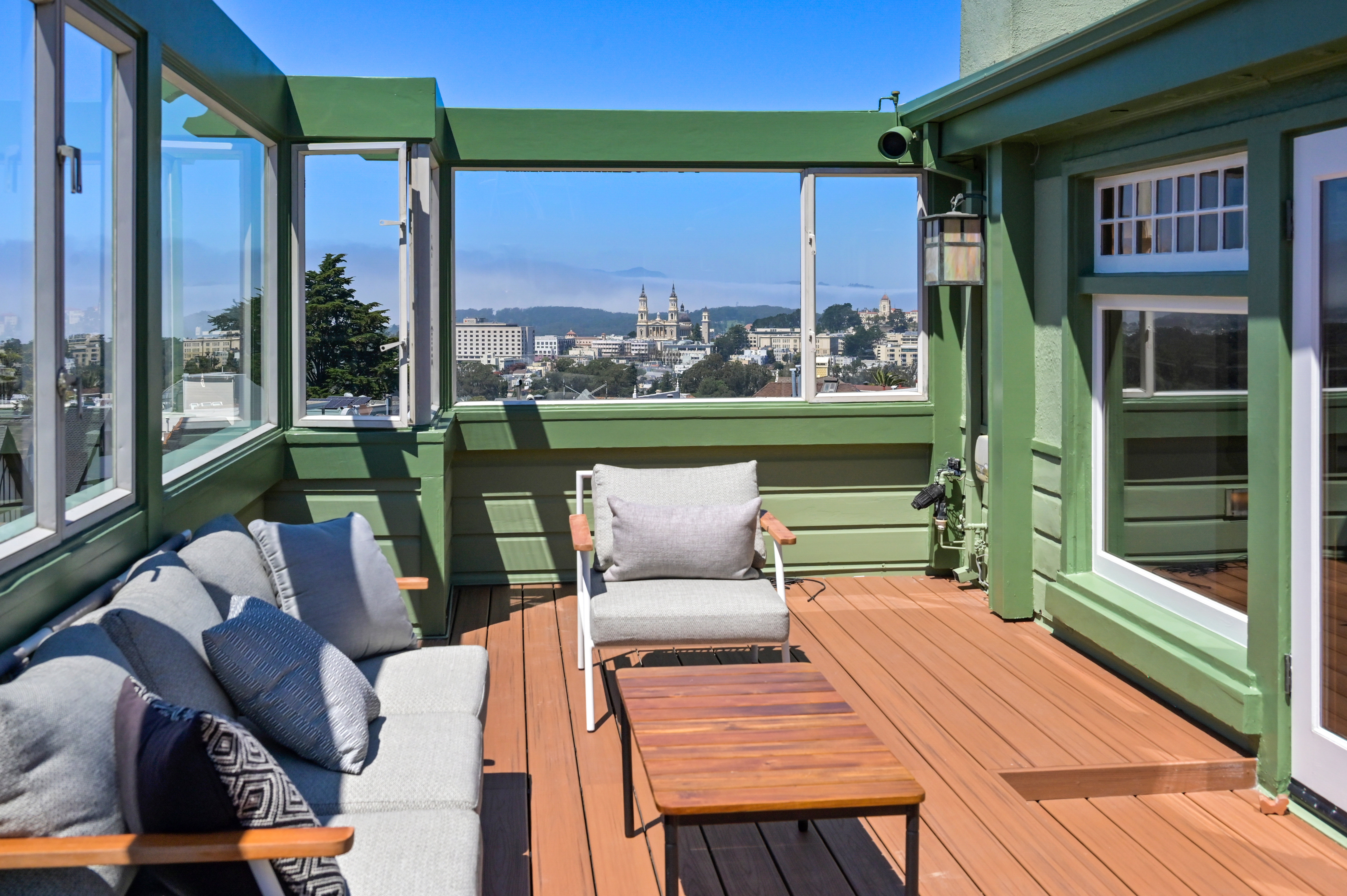 Property Photo: View deck at 4 Ashbury Terrace, showing sweeping panoramic views of San Francisco