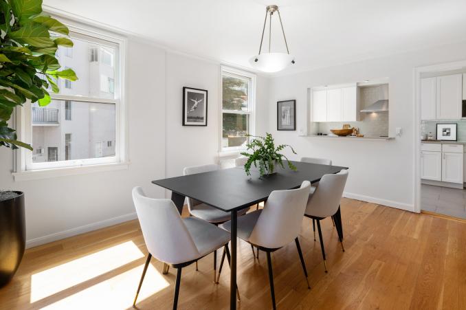 Property Thumbnail: Dining room with an interior buffet kitchen window