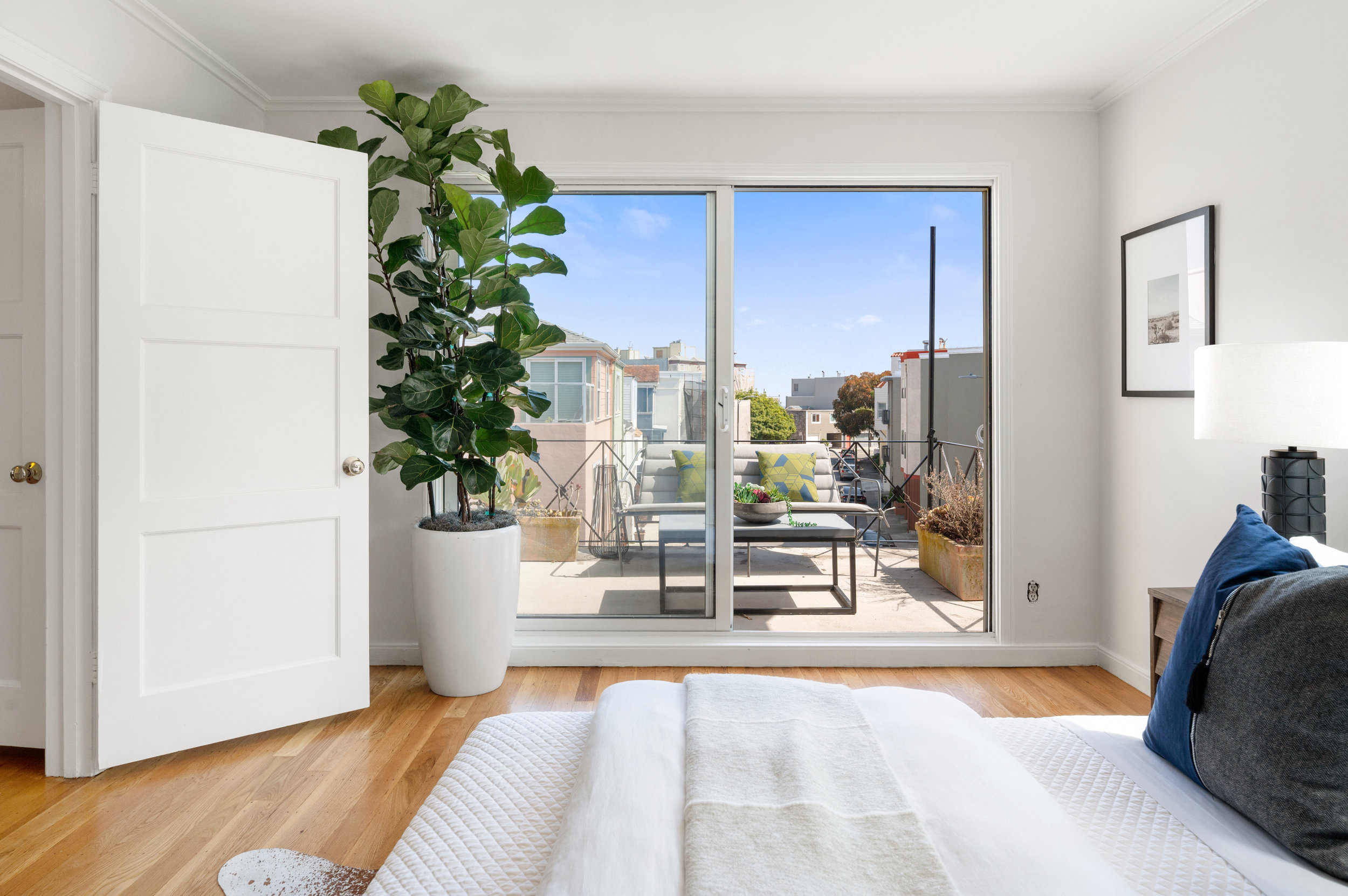 Property Photo: View of the walk-out deck adjoining the second bedroom