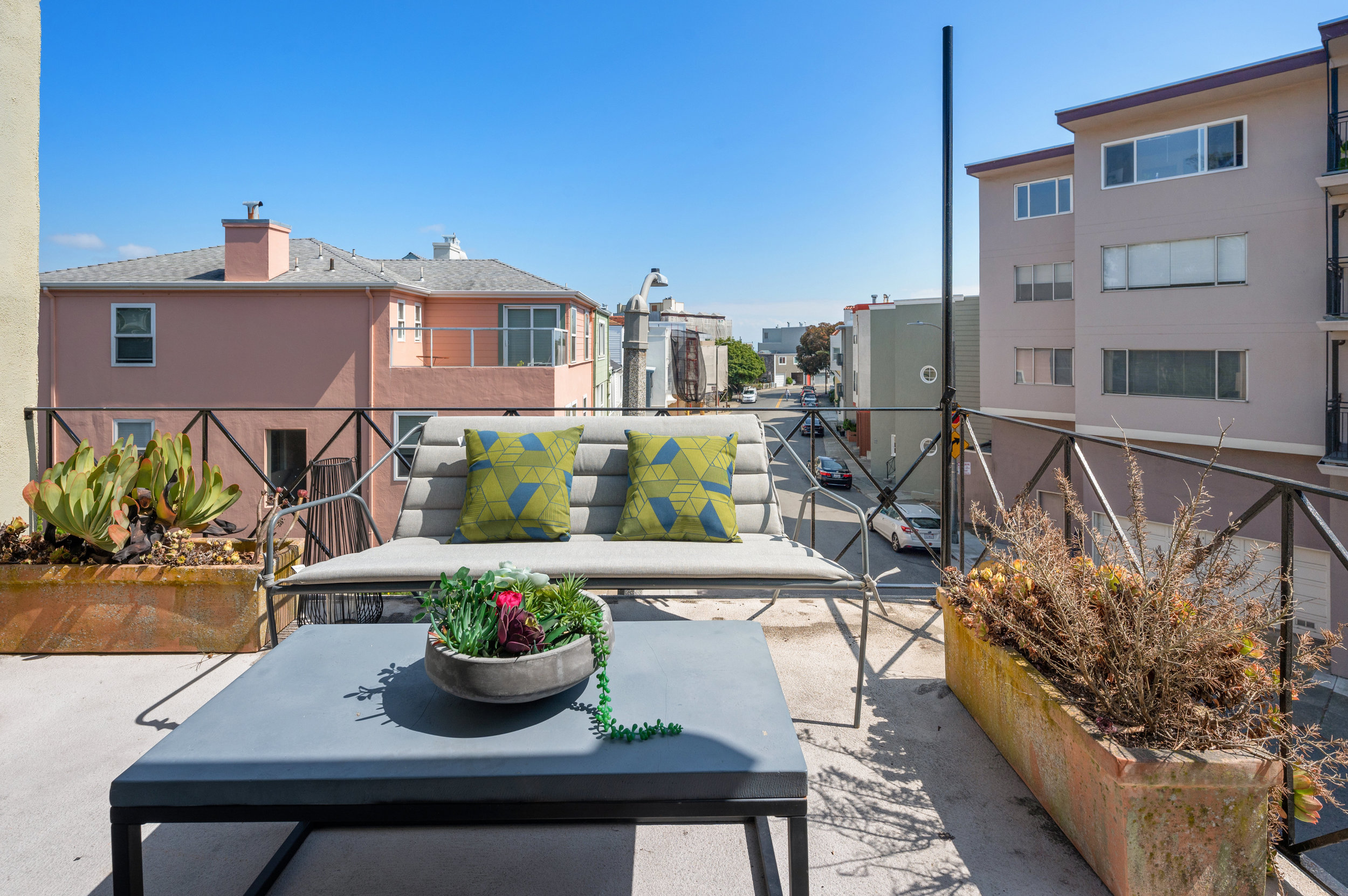 Property Photo: Outdoor living area and deck adjoining the second bedroom