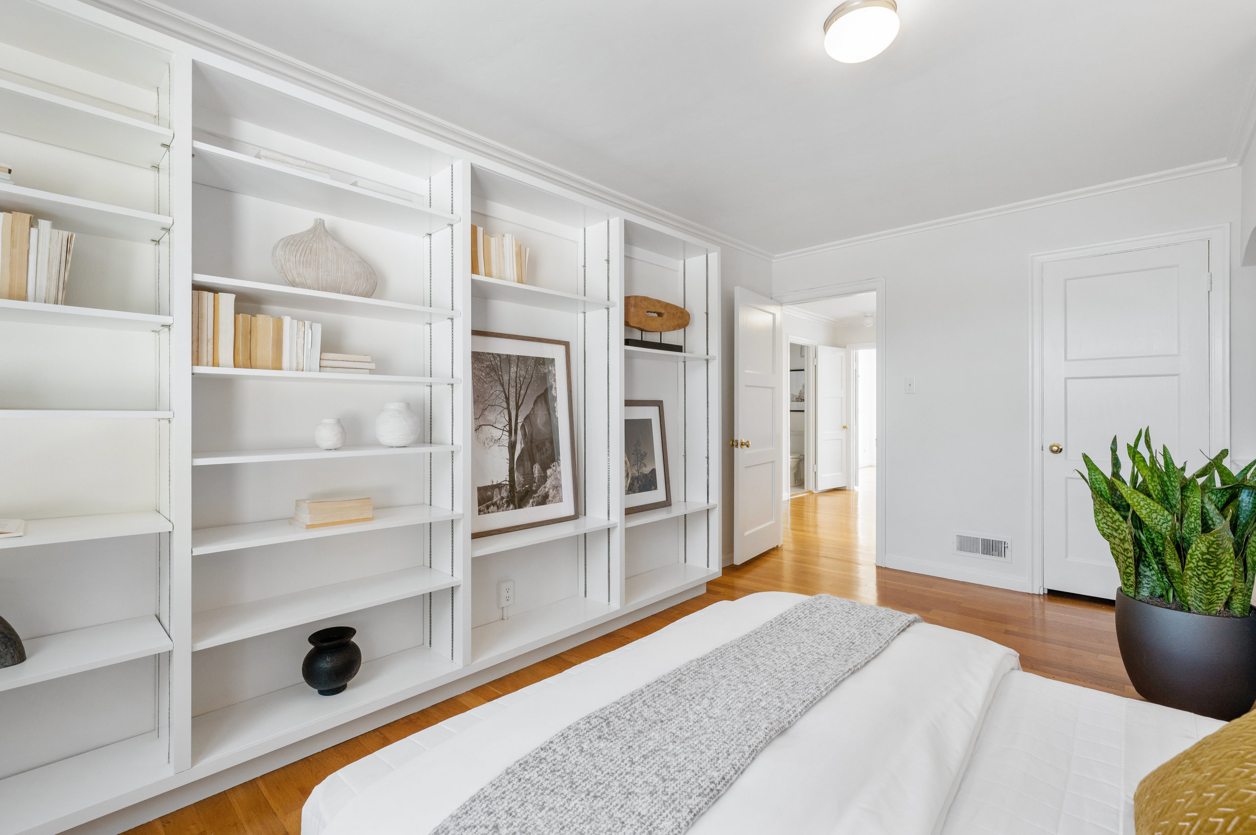 Property Photo: View of the built-in shelves in the fourth bedroom