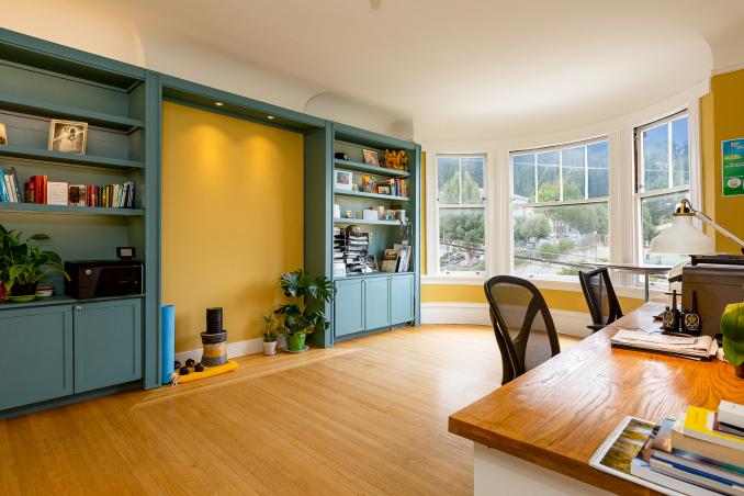 Property Thumbnail: View of the office with built-in cabinets and wood floors