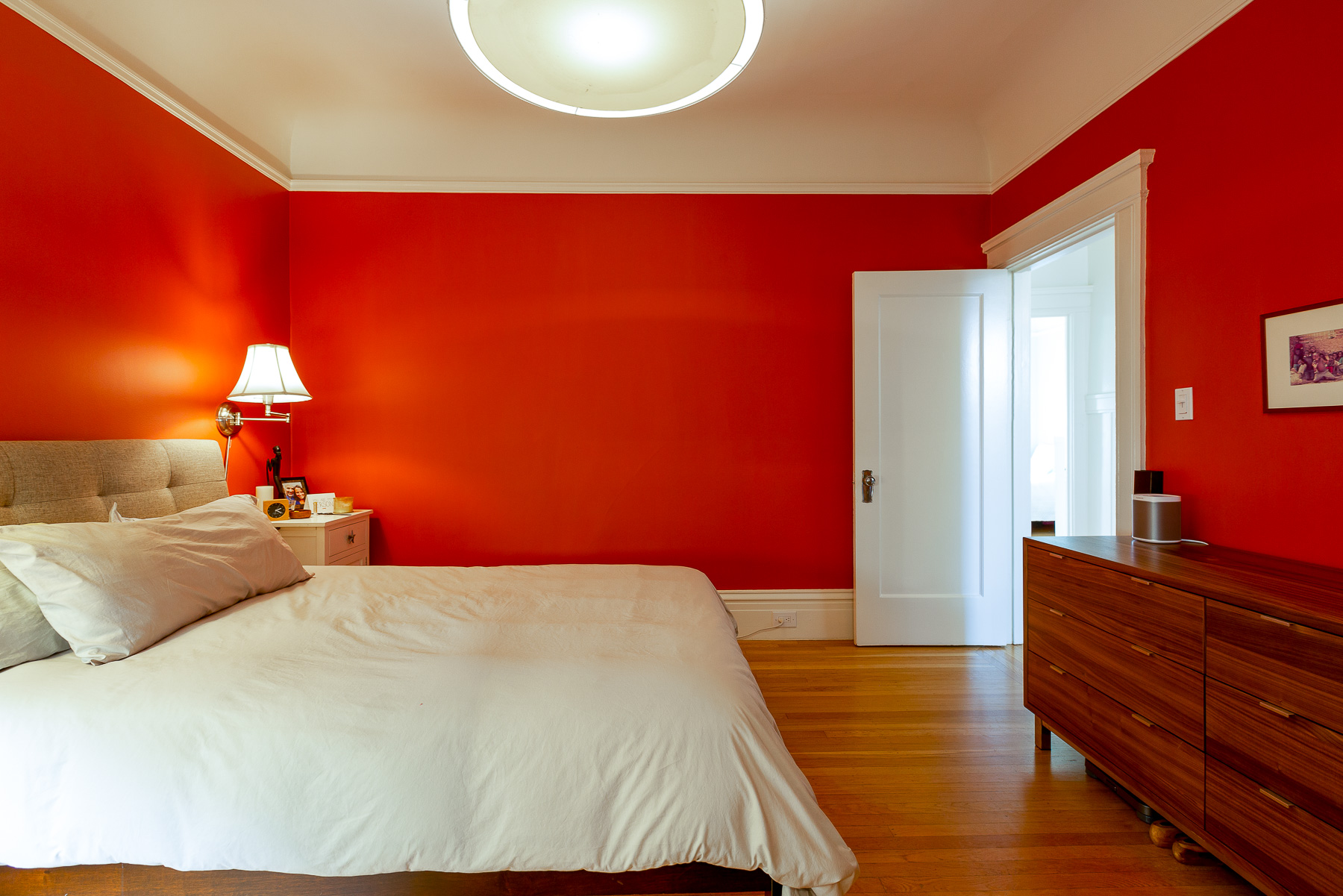 Property Photo: Bedroom two featuring wood floors
