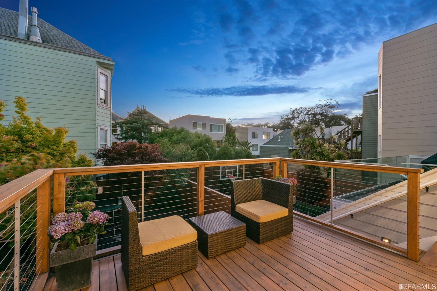 Property Photo: Upper deck at twilight, showing a beautiful blue sky 