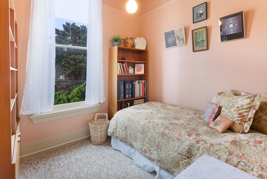 Property Photo: View of a bedroom with a large window