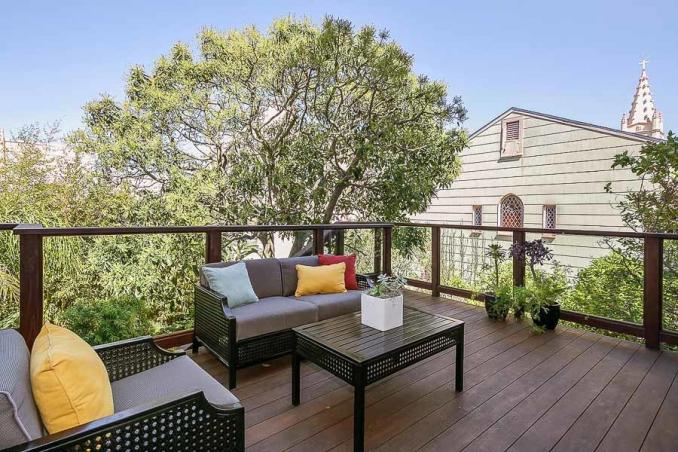 Property Thumbnail: View of a large wood deck and outdoor living area