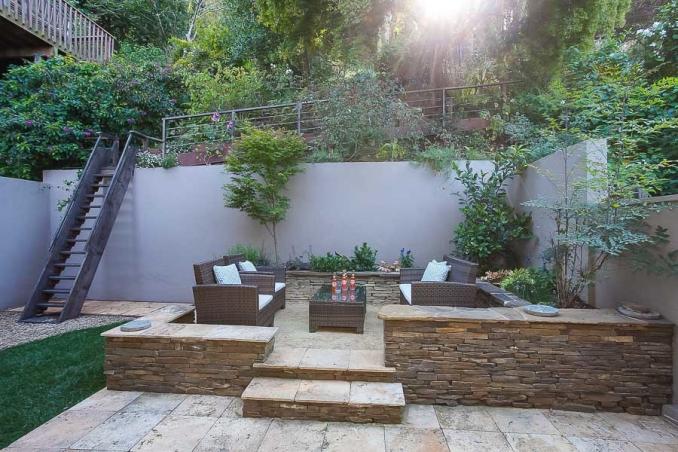 Property Thumbnail: View of the outdoor living space, featuring a stone patio