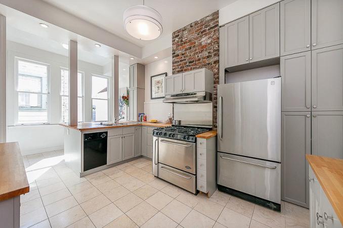 Property Thumbnail: Kitchen, featuring tall cabinetry 