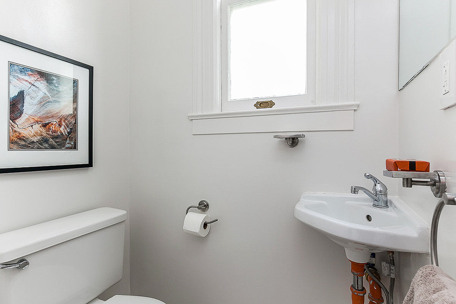 Property Photo: Bathroom with sink and a window