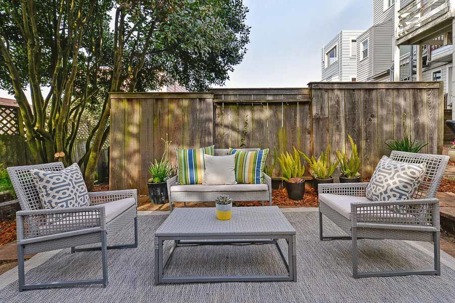 Property Photo: Close-up view of the outdoor living space, featuring plants