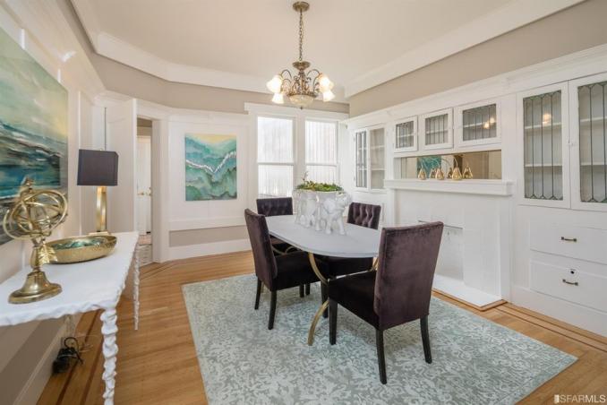 Property Thumbnail: View of the dining room with crown moulding and built-in cabinets