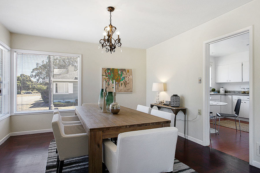 Property Photo: Dining room with large windows