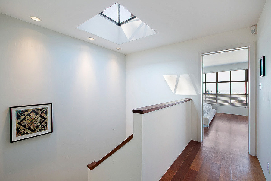 Property Photo: View of a skylight positioned over the staircase 