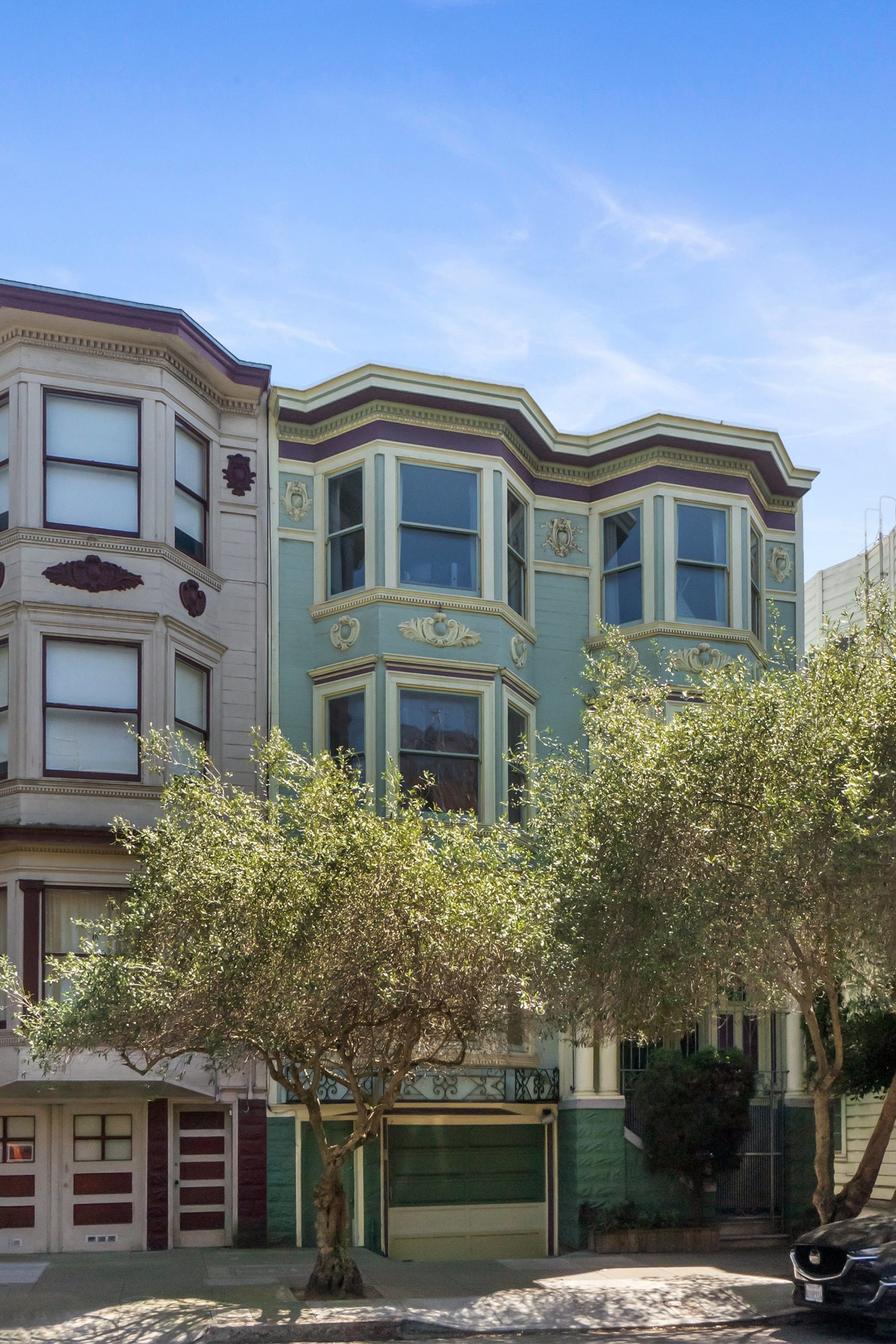 004f004 Street view of 1473 Waller Street, showing a three-story property