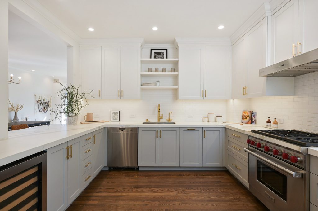 View of a large kitchen with wrap-around counters