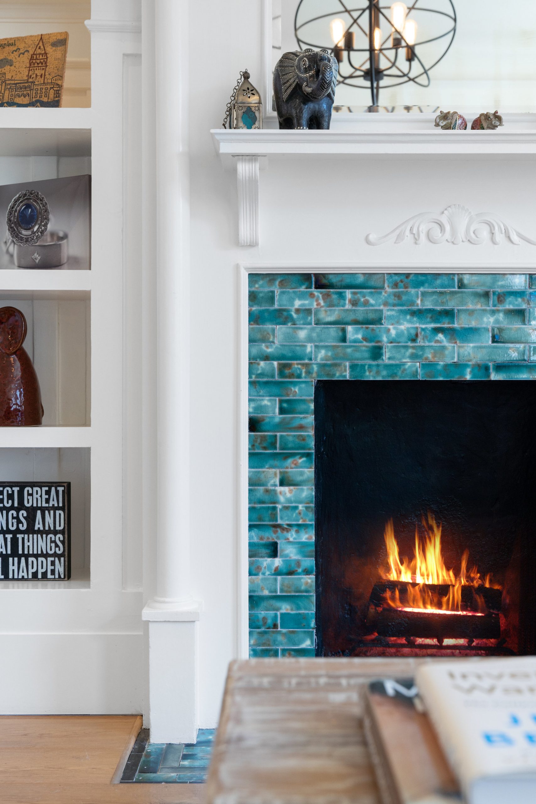 008003.jpgvs2 Close-up view of the turquoise tile and wood mantle surrounding the fireplace