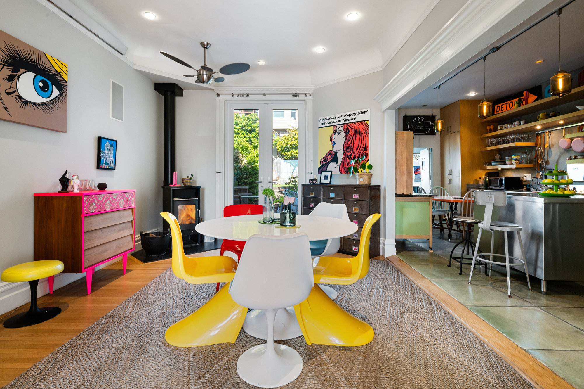 Dinning room adjacent to the kitchen featuring wood floors