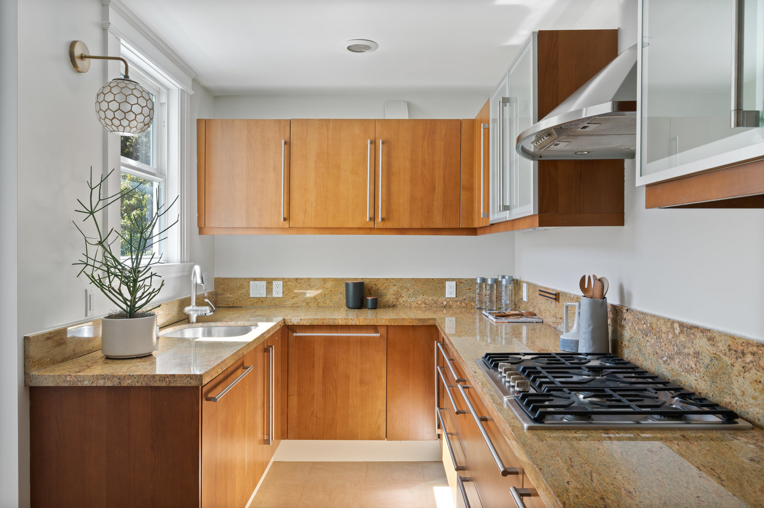 011photos1223shrader012 View of the U-shaped kitchen, featuring beautiful wood cabinets
