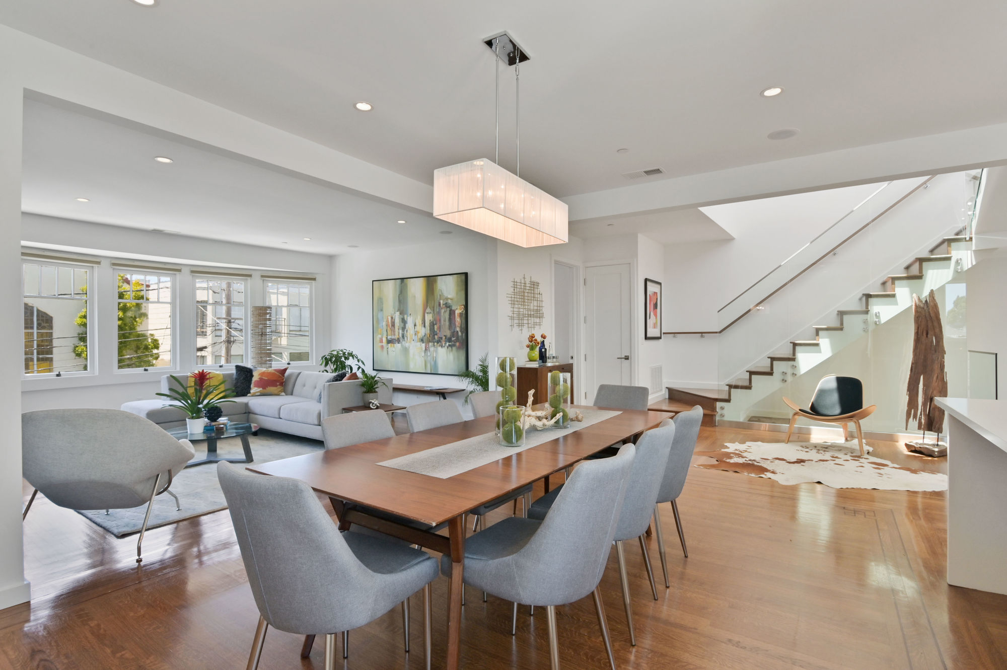 01323 View of the dining area, featuring plenty of natural light and wood floors