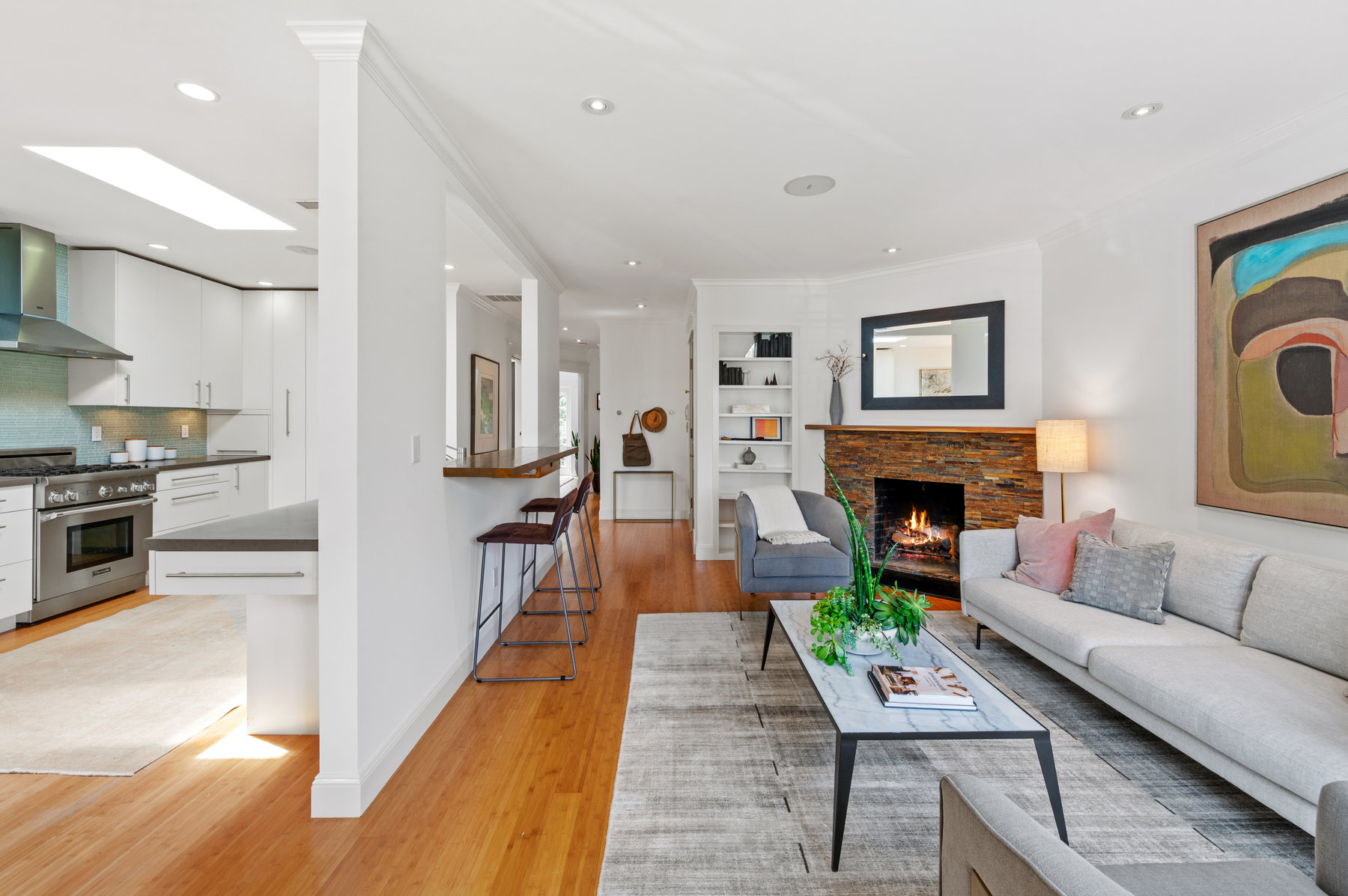 Looking at main living space from french doors. The living room space to the right with dining and kitchen to the left.