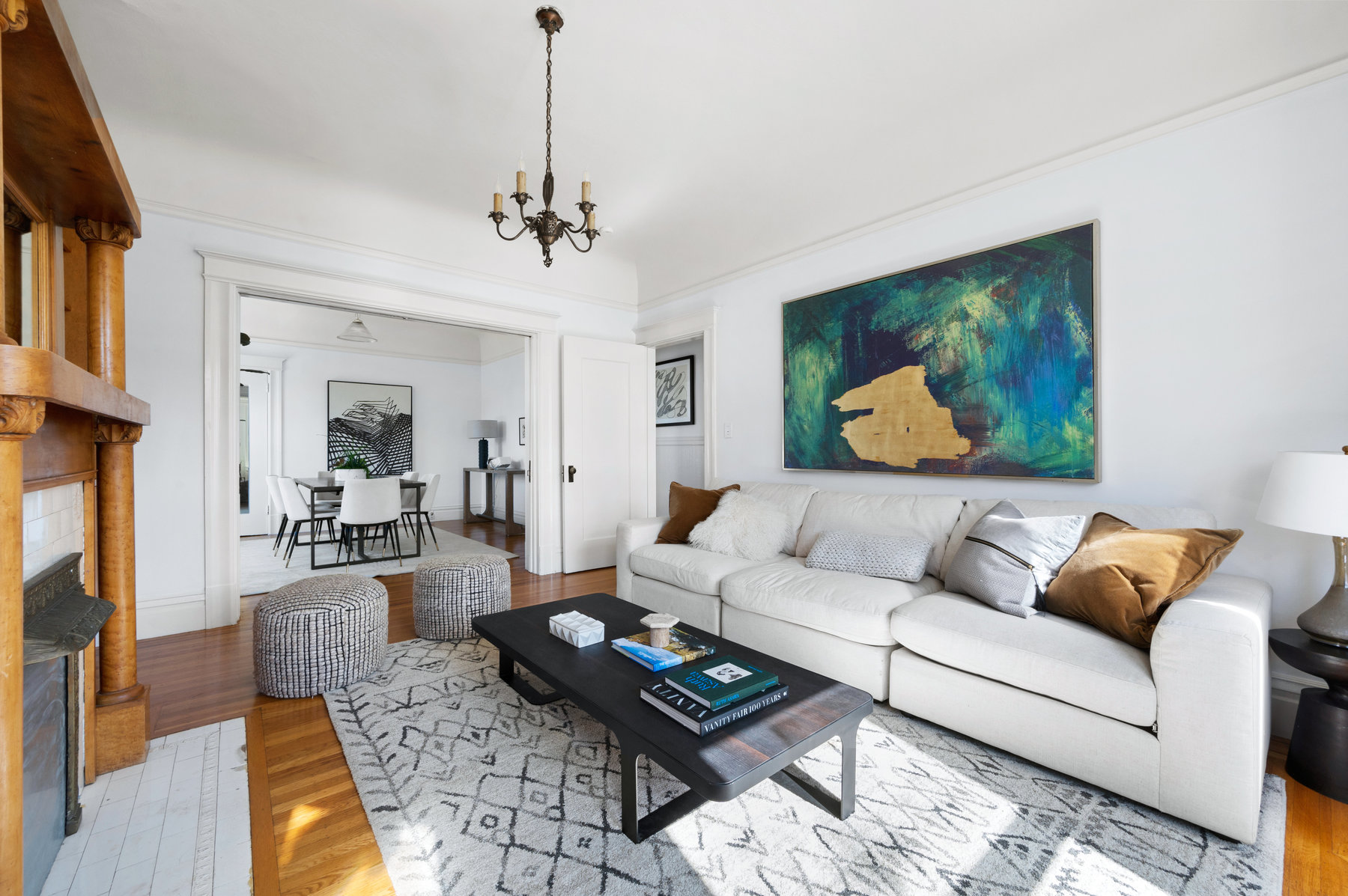 Front sitting room. There pocket doors that are open to formal dining room.