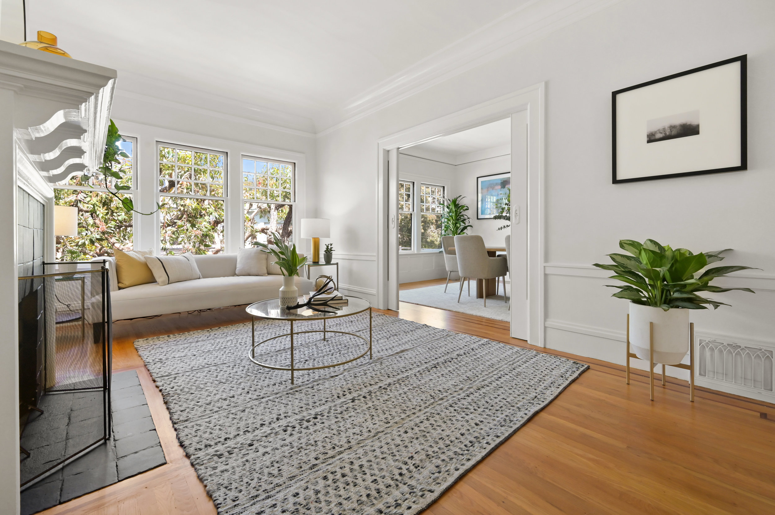 View of the living room at 637-639 Lake Street with partial view of the adjoining dining room