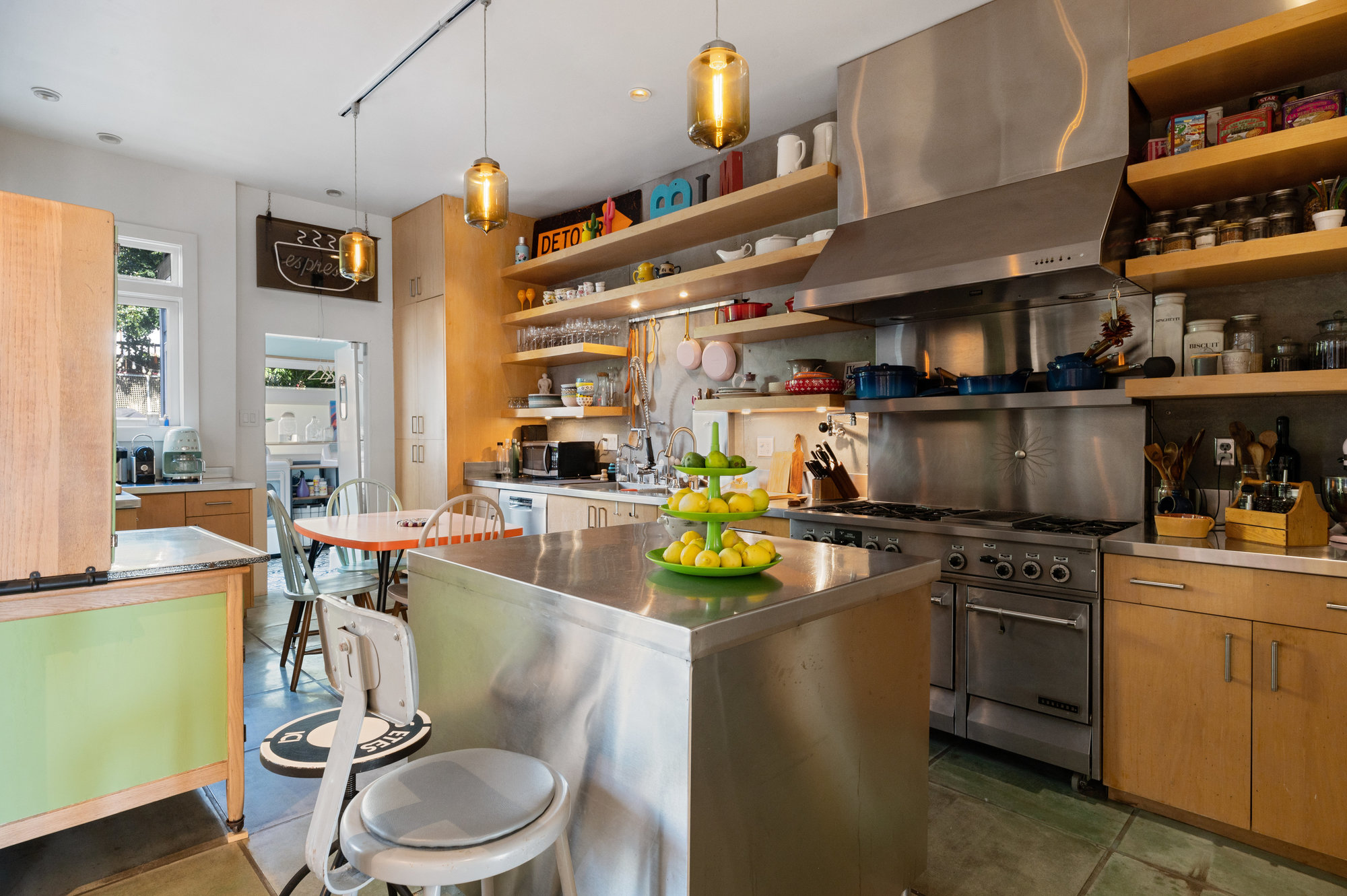 View of the large chefs kitchen featuring tile floors
