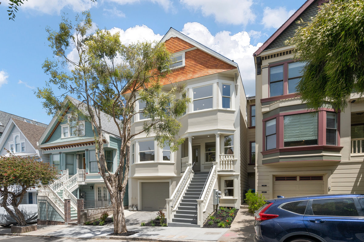 Aerial view of 232 Downey Street, showing a large Victorian home and the Ashbury Heights neighborhood