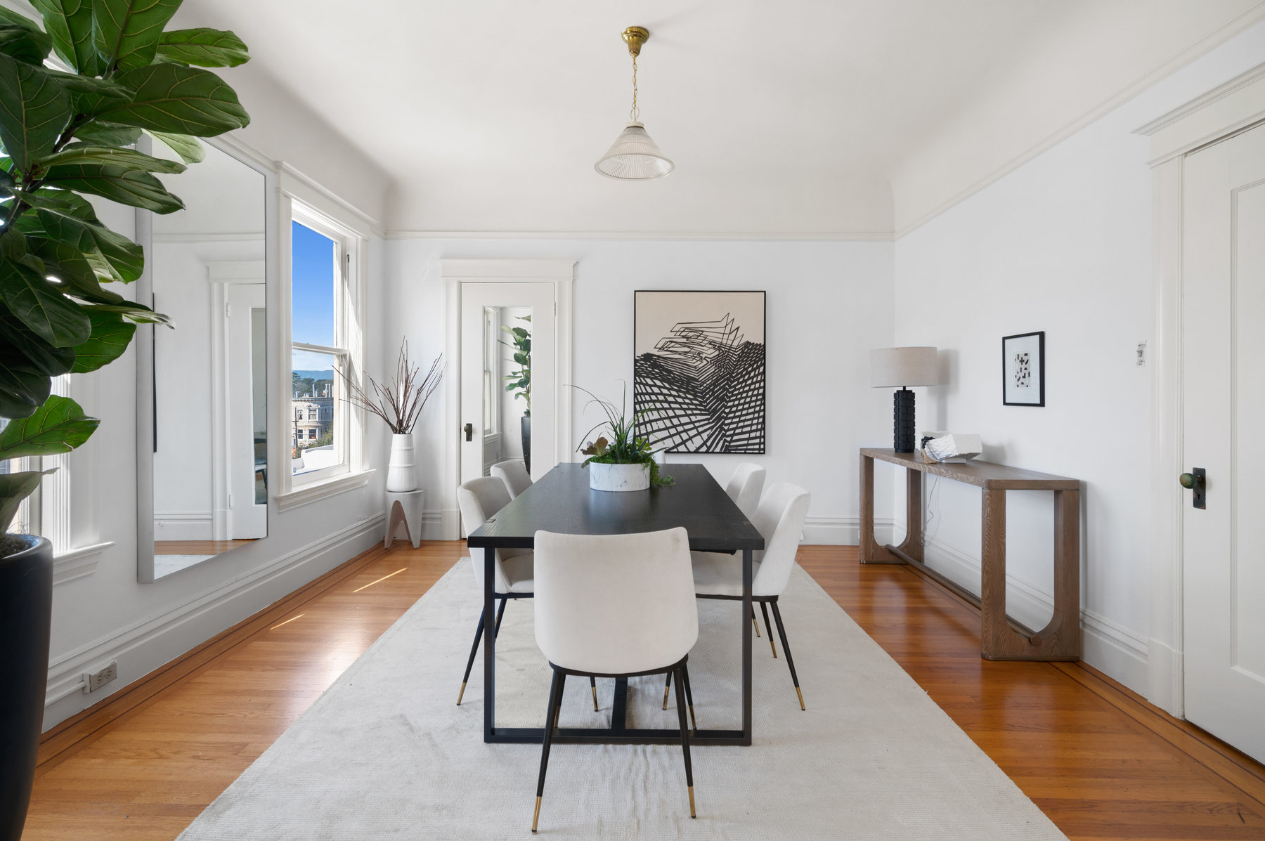 Formal dining room had large windows that look over to Cole Street.