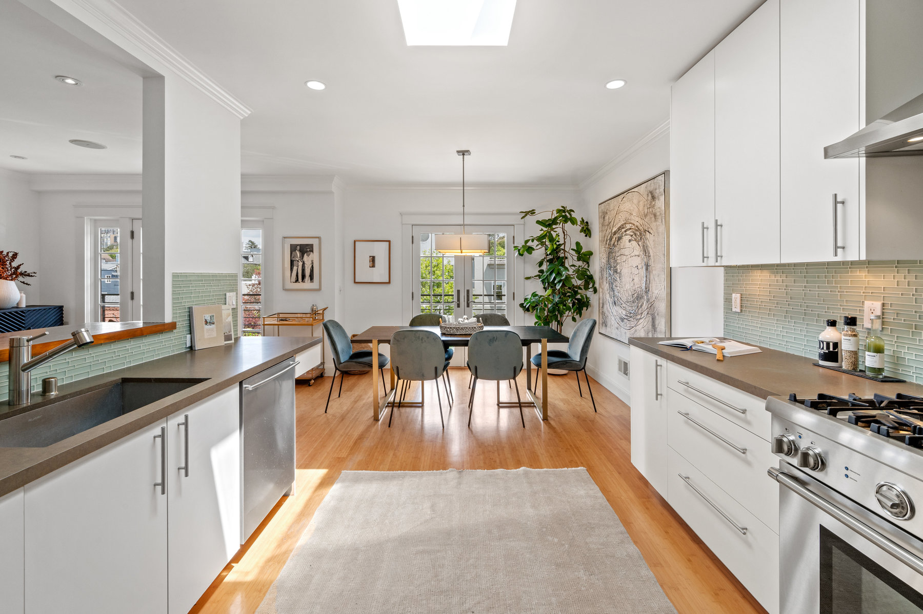 Looking through kitchen at dining space.