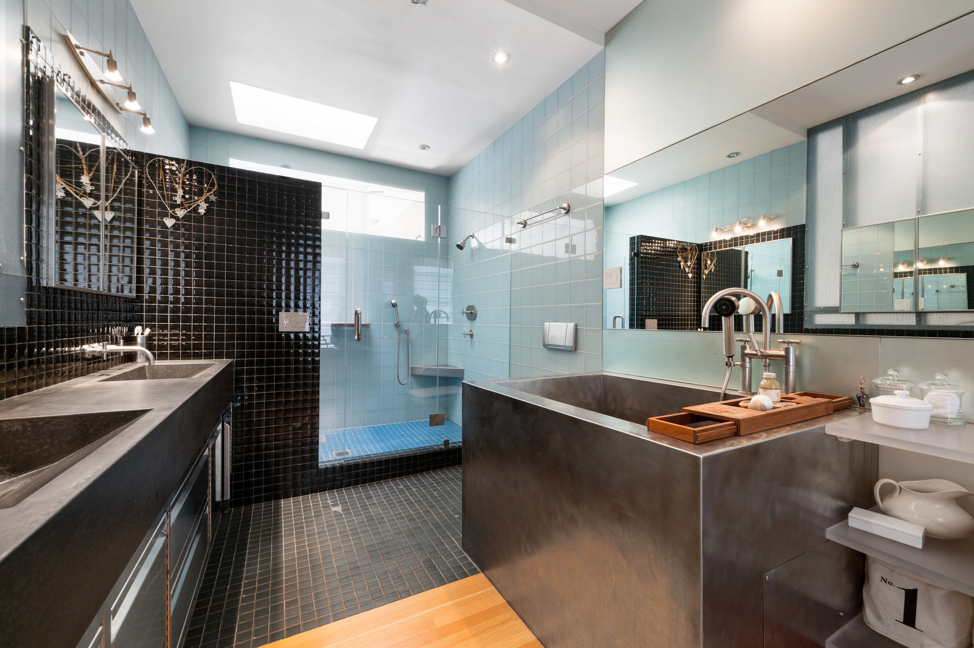 View of a large modern, metal soaking tub