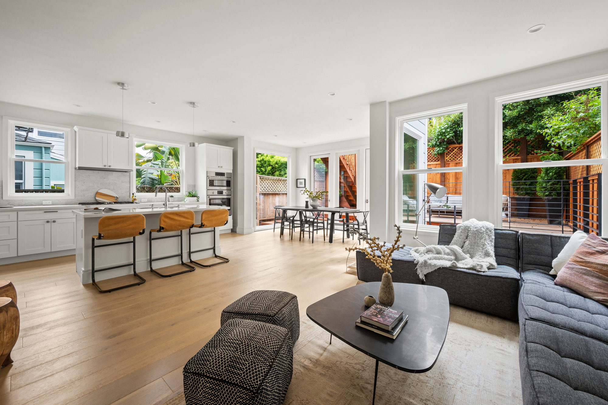Kitchen has island that has seating for 3.