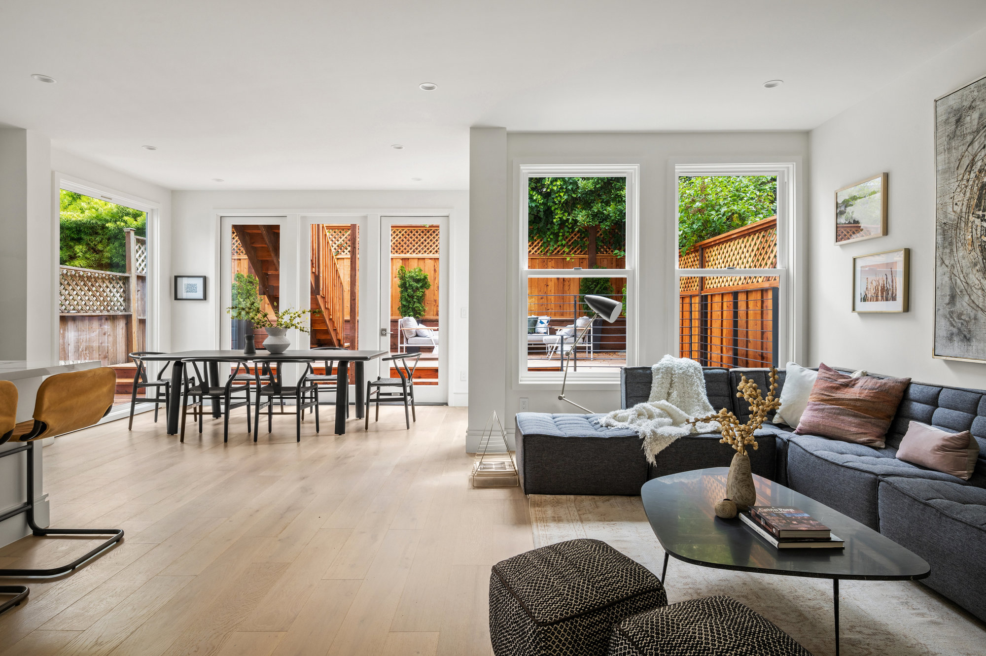 Main living space. There is a living room space to the right, kitchen is the right and dining space is in the back side of room.