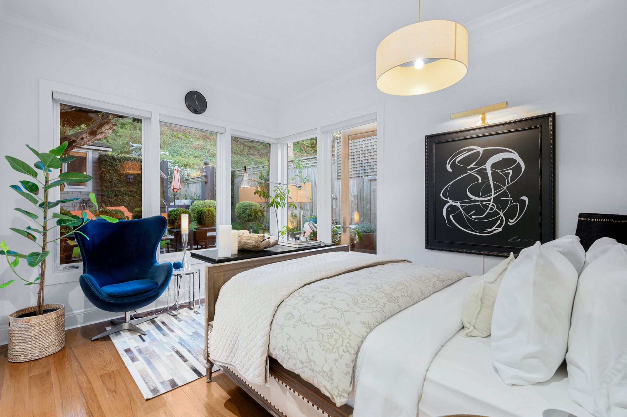 Primary bedroom showing views of the garden
